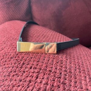 CAbi black skinny belt with gold tone clasp!
